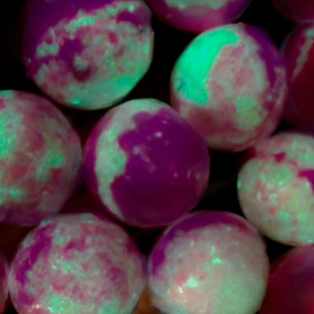 Bombas de baño que brillan en la oscuridad con flores de cerezo